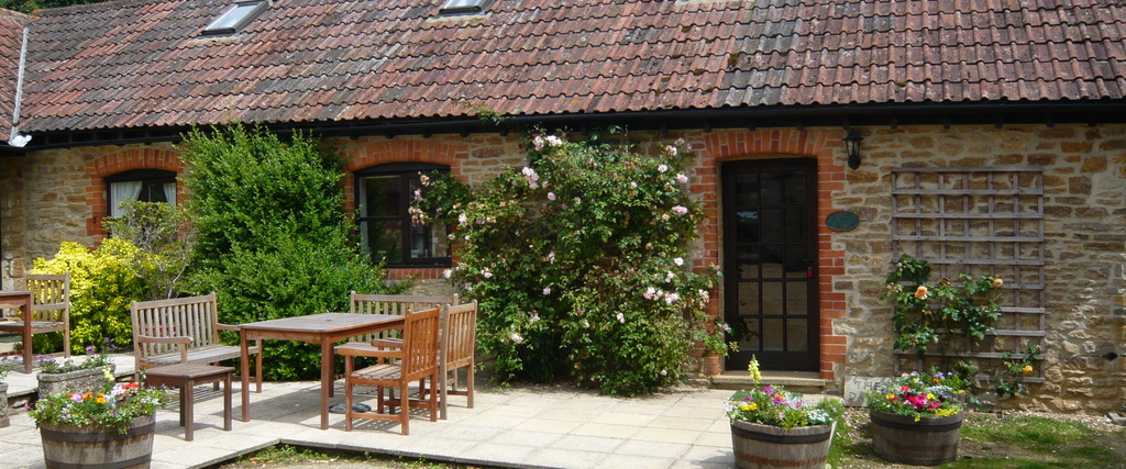Log fires and oak beams - a beautiful farm cottage.